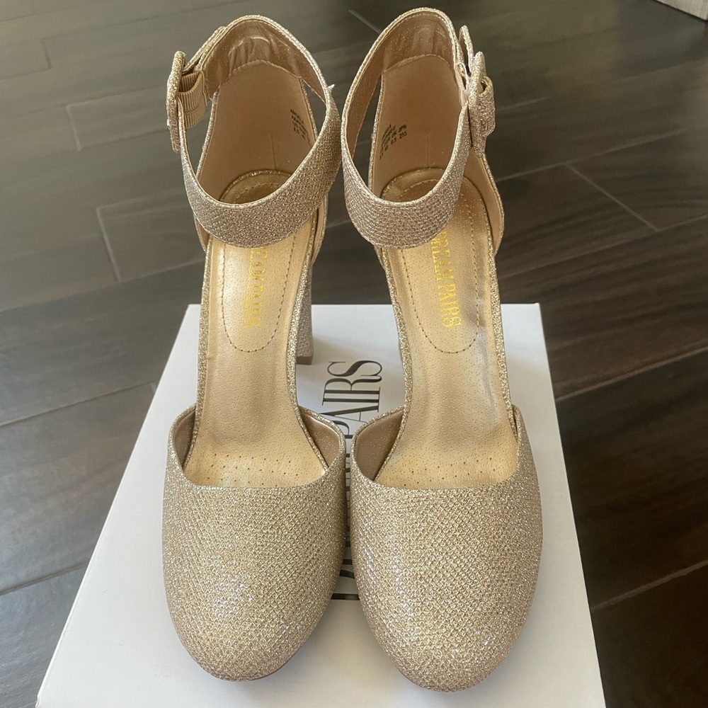 Like new Gold/glitter closed, rounded toe chunky heeled pumps with ankle strap.